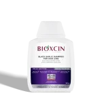 شامپو ضد ریزش مو بیوکسین مدل Black garlic حجم 300میل